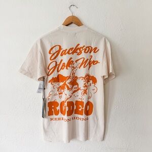 Diamond Cross Ranch Cream + Orange Jackson Hole Wyo Rodeo Graphic T-Shirt